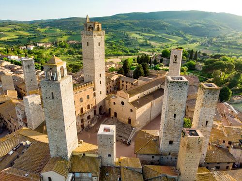 Aerial view of famous medieval San Gimignano hill town with its skyline of medieval towers © Shutterstock